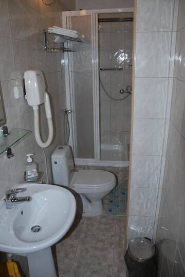 Фото номера Двухместный номер с 2 отдельными кроватями Отель Hotel Jagielloński г. Санок 4